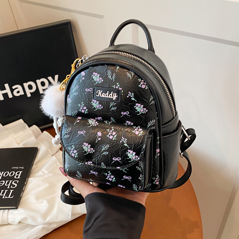 This is a new summer model of a lady's small backpack for students' commuting. It is a high-end and versatile backpack with a sweet Japanese style Specification drawing