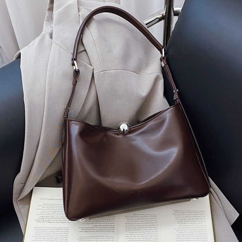 A large capacity bag for women, a new 2025 simple single-shoulder crossbody bag, a fashionable and casual tote bag for work and commuting details Picture