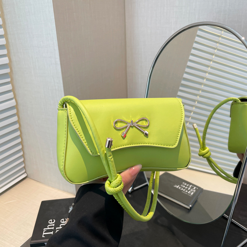 New solid-color, elegant and fashionable Korean-style bow with a stylish texture. Spring 2025 single-shoulder casual underarm baguette bag full figure