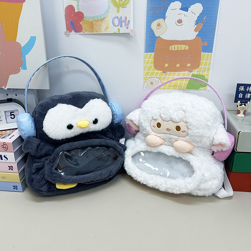 New cute cartoon headphones, penguin backpacks, fluffy little sheep, large-capacity double backpacks, and girlish class bags full figure