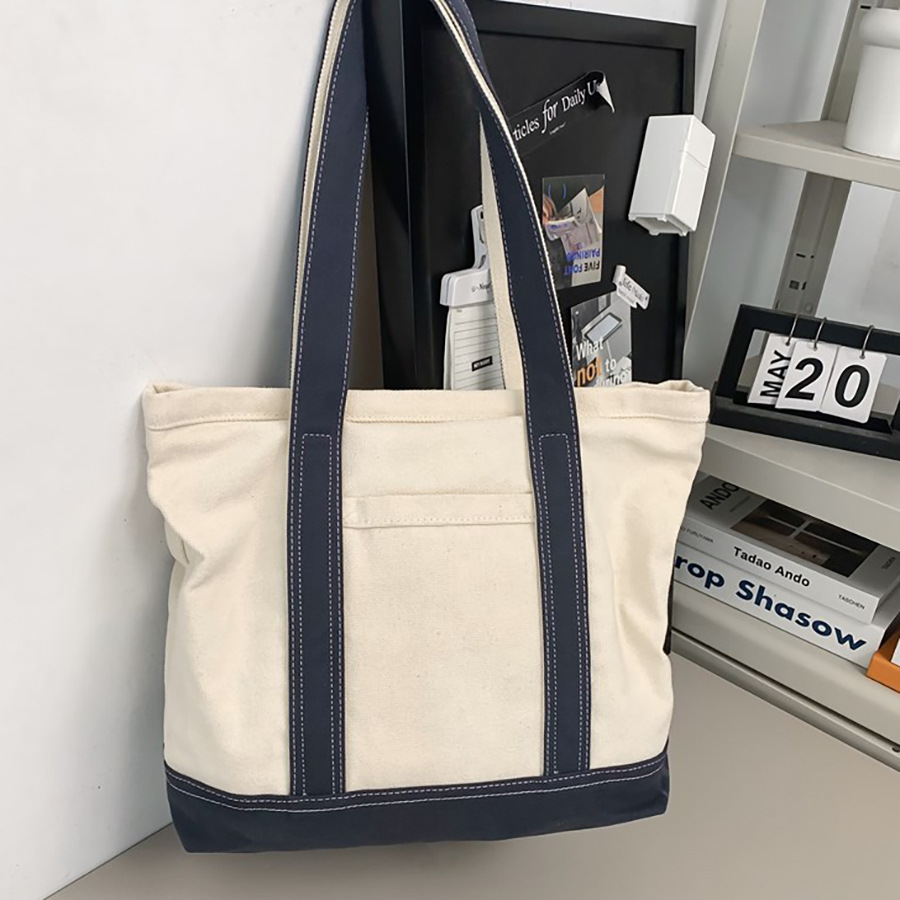 A new trendy and versatile canvas bag for women, a casual tote bag for work and commuting full figure