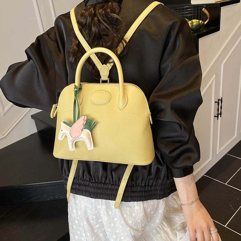 A high-end, light luxury handbag for women, 2025 new style, fashionable, simple and niche backpack, stylish and versatile shell bag details Picture