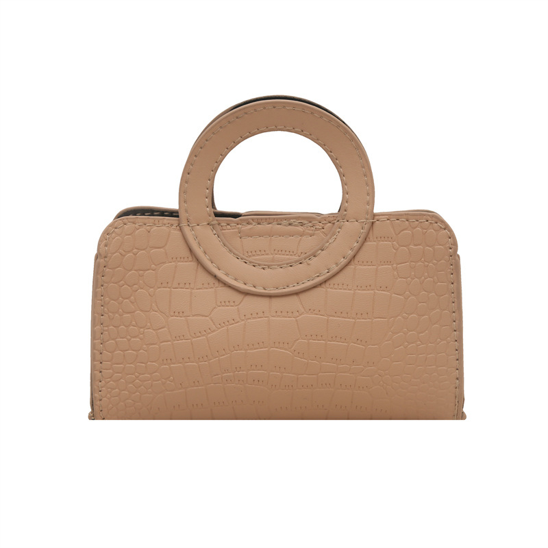 ins Niche Fashion circular handbag 2025 New style solid color casual stone pattern small square bag Item Picture