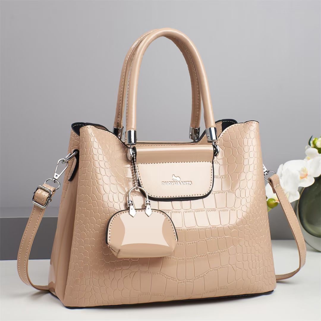 The new women's handbag from foreign trade features a trendy and retro texture. It is a large-capacity casual and versatile crossbody bag with a fashionable and elegant style Application Scenario