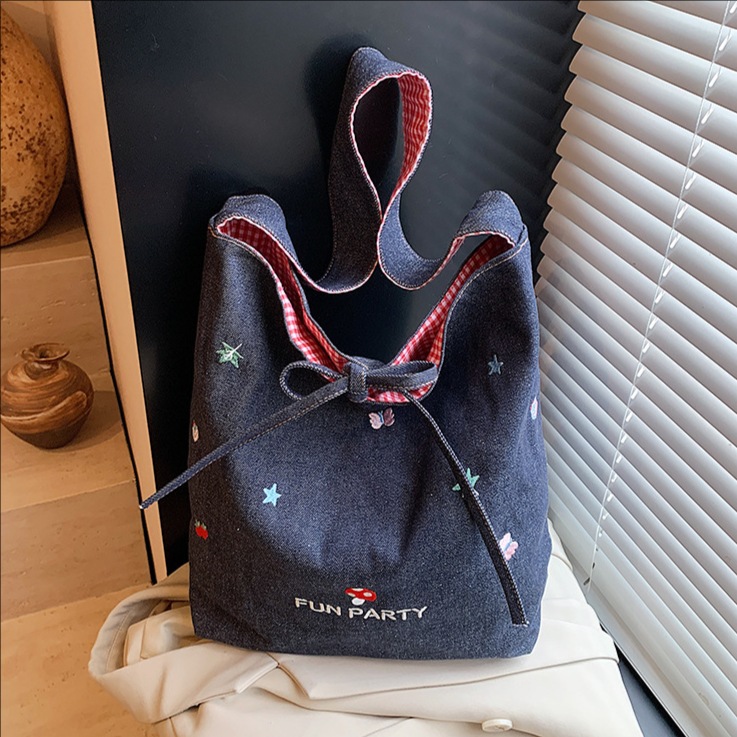 Korean-style printed fashionable large-capacity bucket bag for women 2025 new style casual commuting laid-back single-shoulder crossbody bag full figure