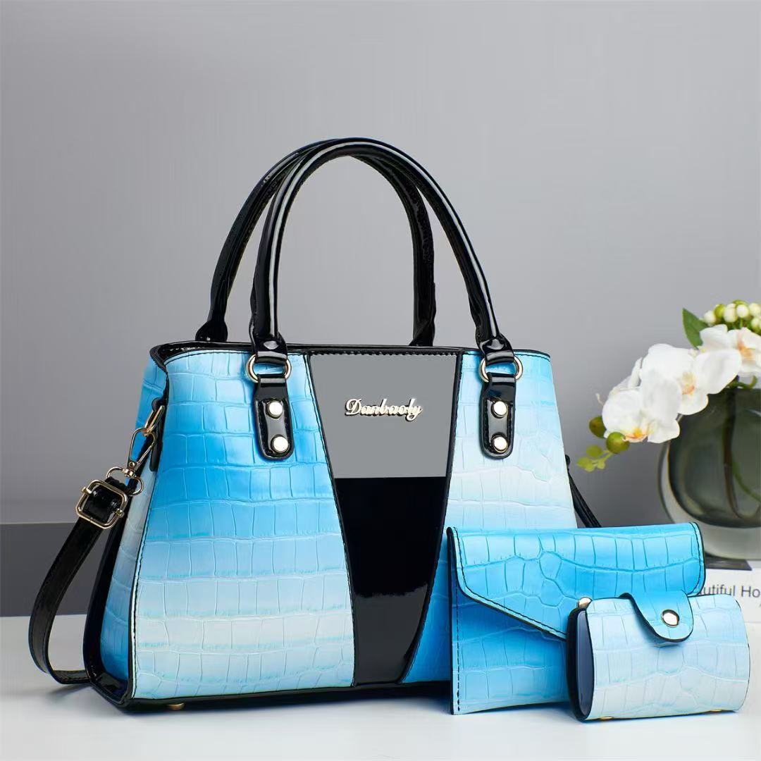 This is a large-capacity, fashionable and versatile three-piece handbag set for women's trade. It features crocodile texture and embossed patterns, with a large capacity and a stylish look Specification drawing