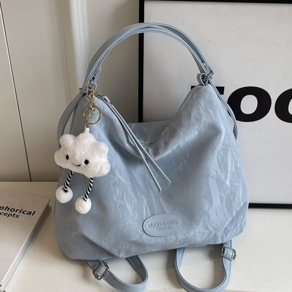 Korean large-capacity commuter tote bag for women, 2025 new style, high-end feel, backpack, versatile shoulder bag, travel backpack full figure