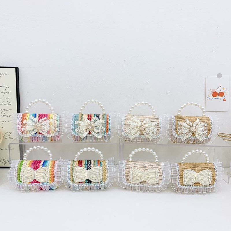 2025 New style girl gift for kindergarten Children's Day: Pearl bow, straw-woven hand-held bag, crossbody full figure