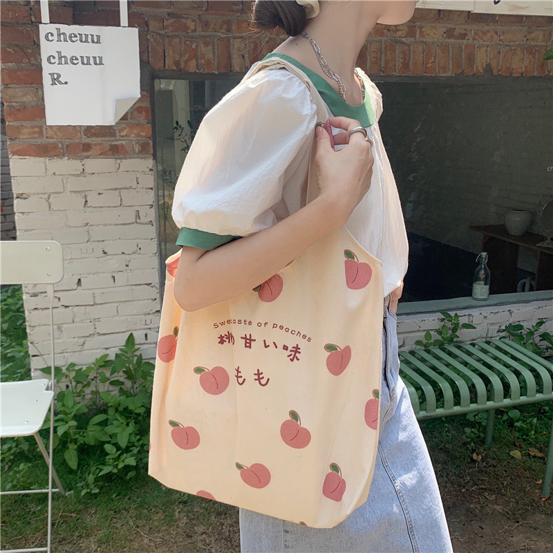 【 In Stock 】1552 canvas bag for Girls, a fresh and cute peach-printed single-shoulder bag, a Japanese college student schoolbag full figure