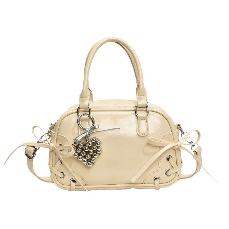 A stylish and sweet bow hand-held Boston bag for women, a new style of high-quality commuting versatile single-shoulder crossbody bag for 2025 Item Picture