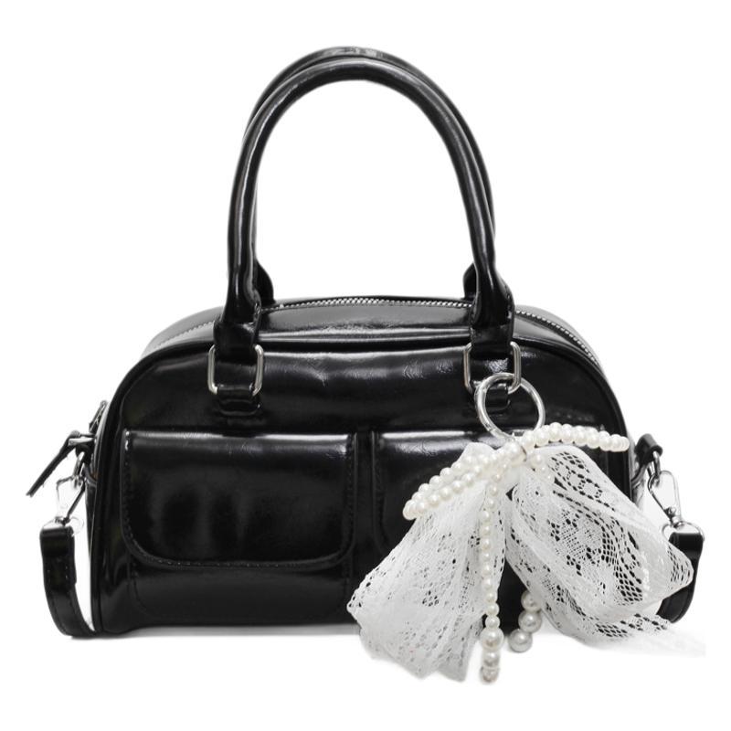 Stylish and niche hand-held bowling bag for women, 2025 new style casual and versatile single-shoulder bag, soft leather crossbody pillow bag Item Picture