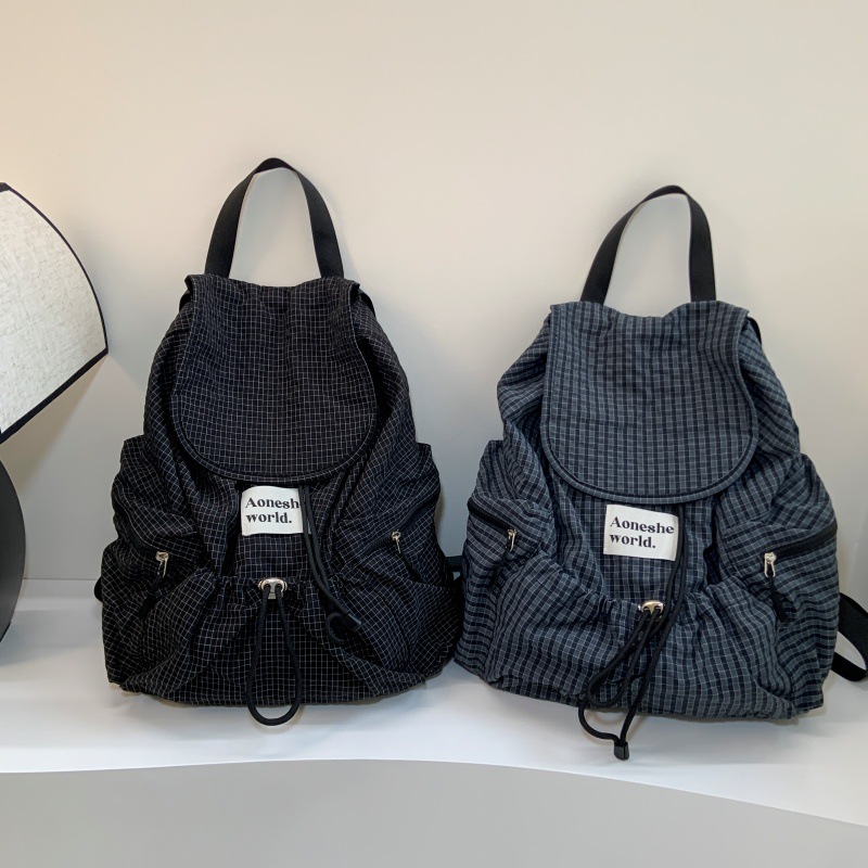Casual large-capacity, lightweight, solid-color backpack, women's drawstring with checkered pattern, versatile, street fashion, student schoolbag full figure