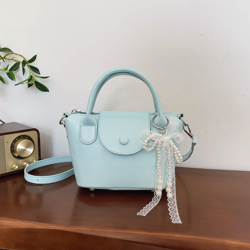 Popular women's retro 2025 Spring New style bag cover casual crossbody bag Korean version hand-held bucket bag full figure