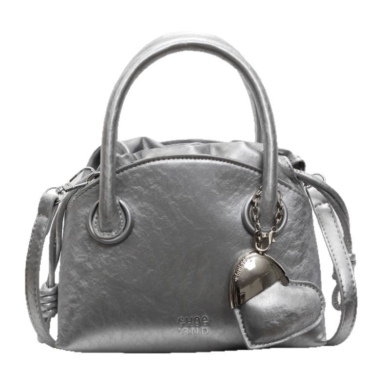 Korean niche hand-held shell bag for women 2025 new style fashionable single-shoulder underarm bag, casual and versatile crossbody bucket bag Item Picture