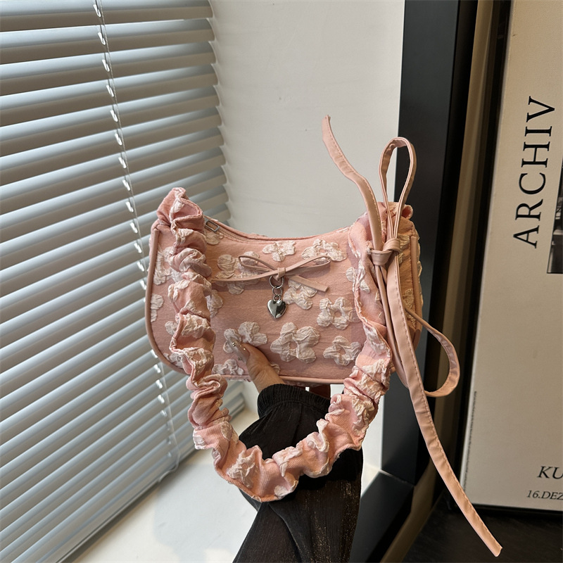 A new summer fashion single-shoulder bag for women in 2025, featuring a unique Instagram Korean-style pleated crossbody full figure