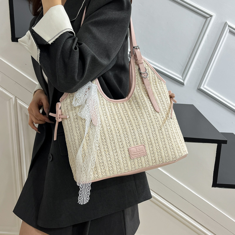 2025 Summer New seaside vacation woven beach bag, women's niche casual single-shoulder bag, large-capacity commuter tote bag details Picture