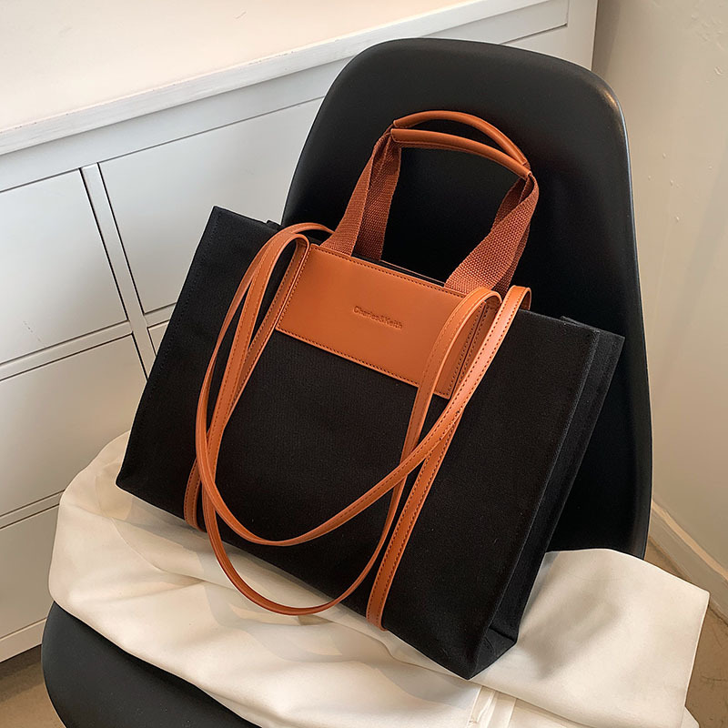 A new 2025 fashionable and casual canvas bag, a large hand-carry bag for university commuting, a versatile and trendy women's large-capacity tote bag Specification drawing