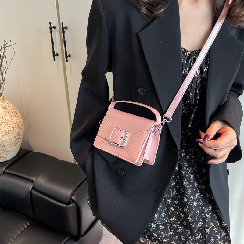 Korean solid color simple and niche belt mini hand-held square bag for women 2025 summer new style cute little wallet Application Scenario