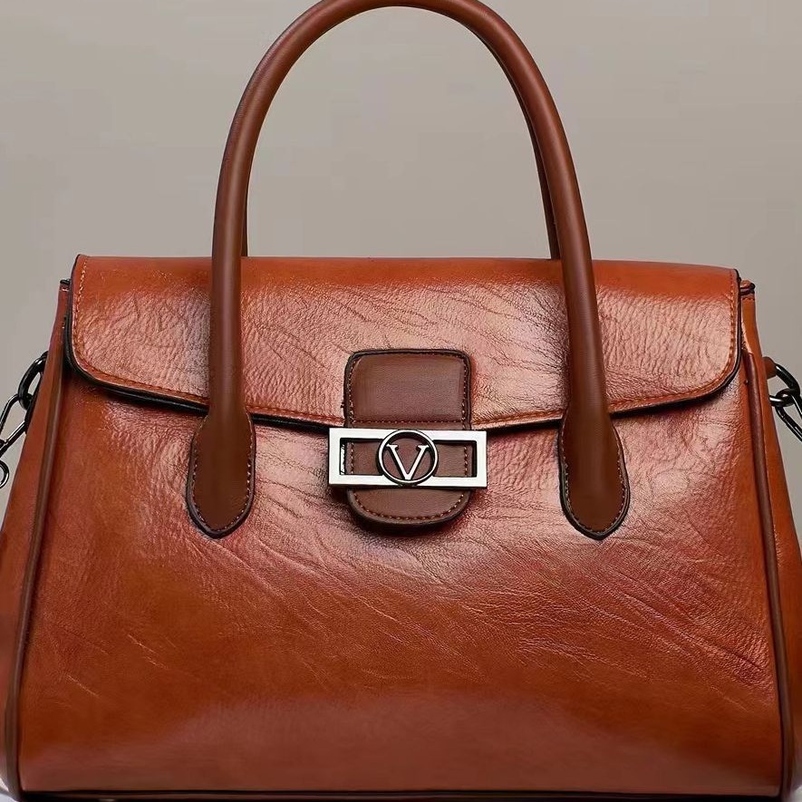 A new Korean-style stylish commuter women's bag for foreign trade, with a large capacity, fashionable and simple design, hand-held shoulder, and a soft leather-like tote bag Specification drawing
