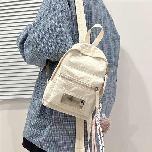 Nylon fabric large-capacity backpack 2025 new multi-functional student class solid color casual travel backpack full figure