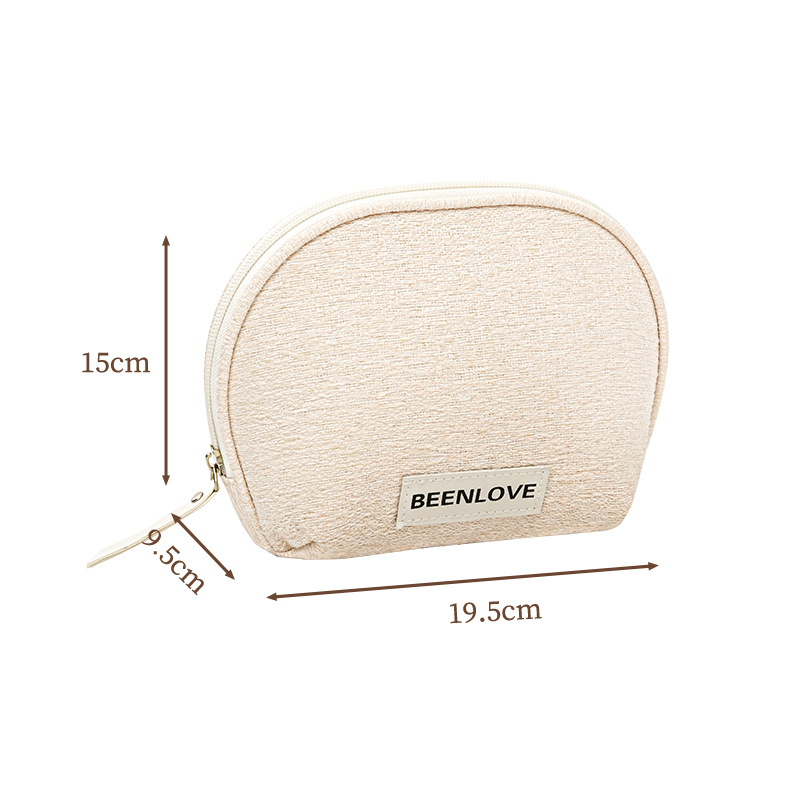 Runhui's new woven snow semi-circular makeup bag, travel cosmetics storage bag, mini hand-held small makeup bag, high appearance level Item Picture
