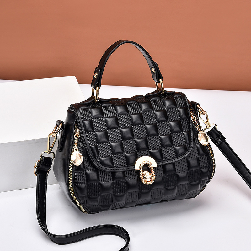 2022 New trendy and versatile women's bags with embossed patterns for foreign trade, simple hand-held small square bag, fashionable single-shoulder bag, crossbody bag full figure
