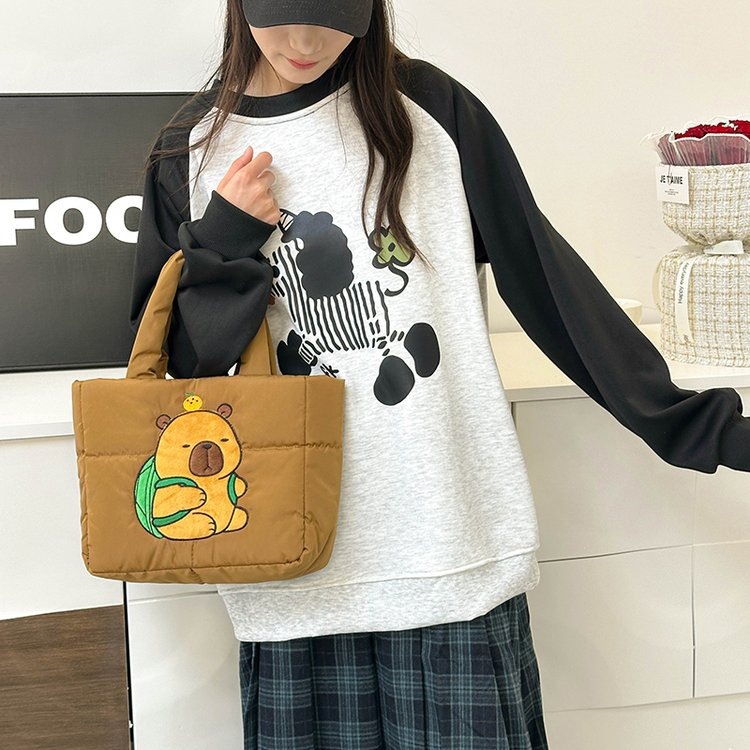Wholesale of new Capibara handbags, large-capacity tote bags, casual and versatile toy figurines, and commuter single-shoulder bags details Picture
