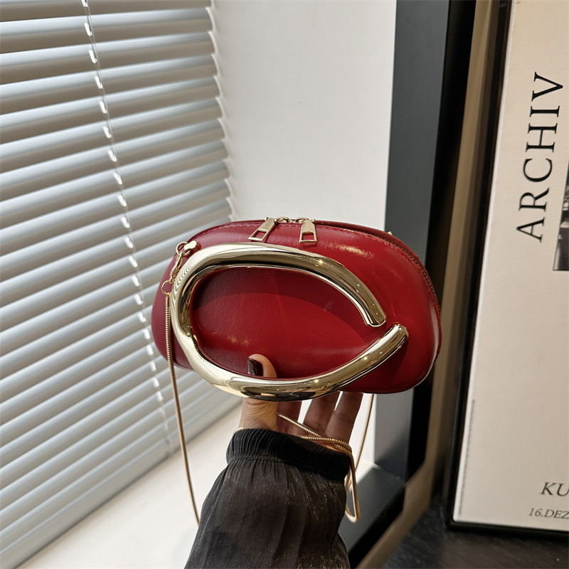 2025 New style personalized round box hand-held dinner bag, small bag, retro hardware metal handle chain crossbody bag full figure