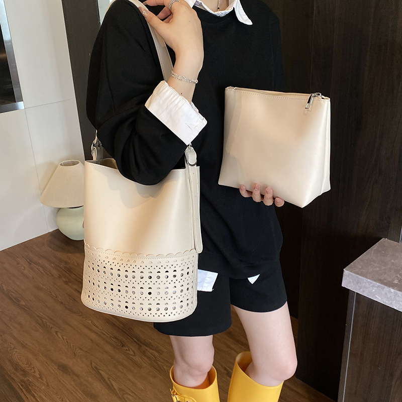 Hollowed-out solid color fashionable large-capacity bucket bag for women 2025 new style, stylish, versatile, casual and simple single-shoulder crossbody bag details Picture