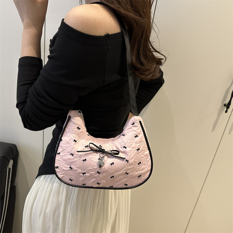 Korean-style sweet peffle-knit bow underarm bag, a high-end women's black and pink color contrast single-shoulder crossbody bag for commuting details Picture