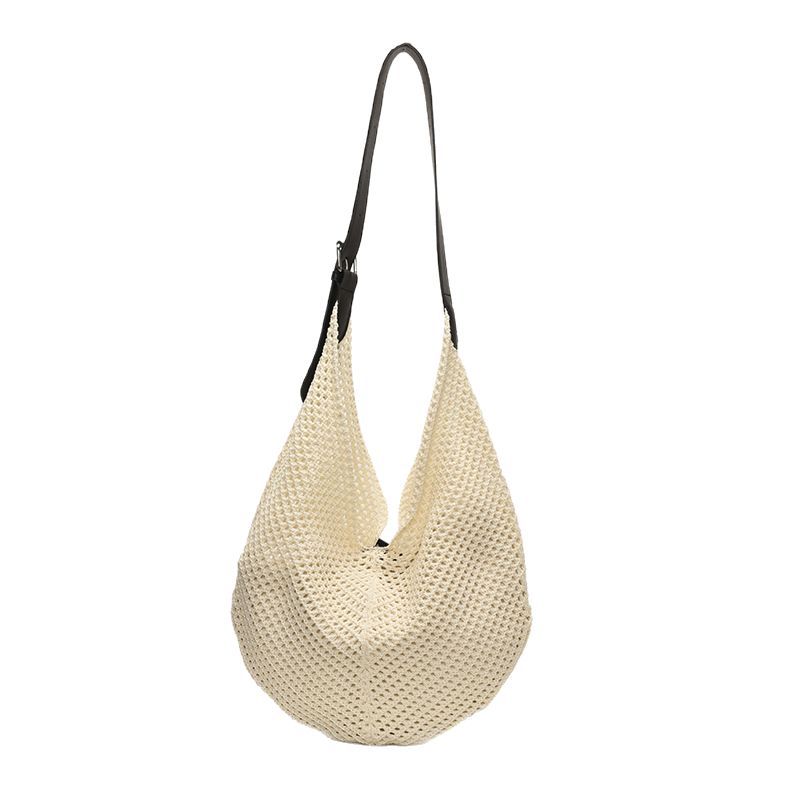 2025 New niche ins hollowed-out patchwork woven bag, summer casual seaside vacation beach single-shoulder armpit bag Item Picture