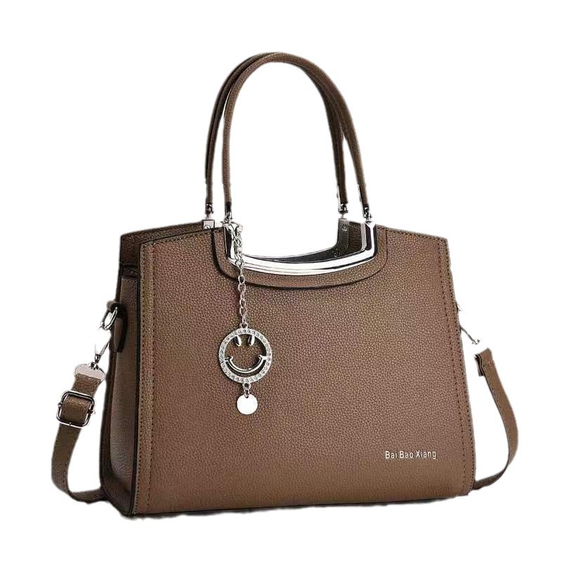 The new macaron handbag is a fashionable and trendy cross-border versatile women's bag with a high-end feel. It features a large capacity single-shoulder bag and a crossbody bag Item Picture