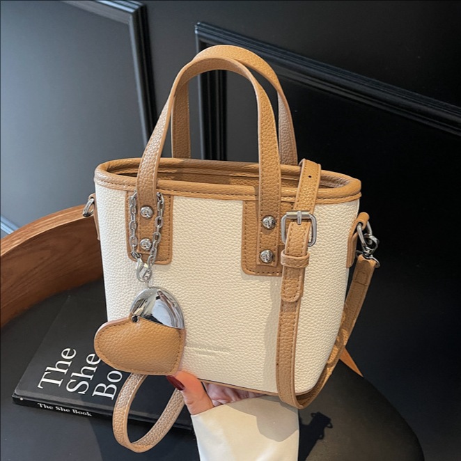 The 2025 new summer fashion and casual large-capacity hand-held bucket bag is a high-end, stylish and versatile single-shoulder crossbody bag for women full figure