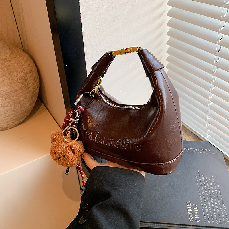 Retro and fashionable hand-held pea bag for women, 2024 new simple and casual single-shoulder bag, niche design, high-end women's bag details Picture