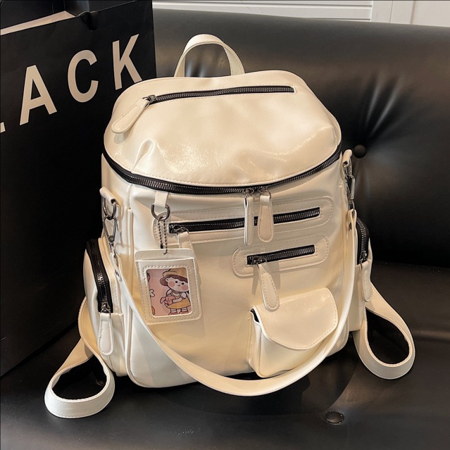 A trendy motorcycle backpack for girls in 2025, a new multi-pocket zipper backpack for college students' school bags full figure