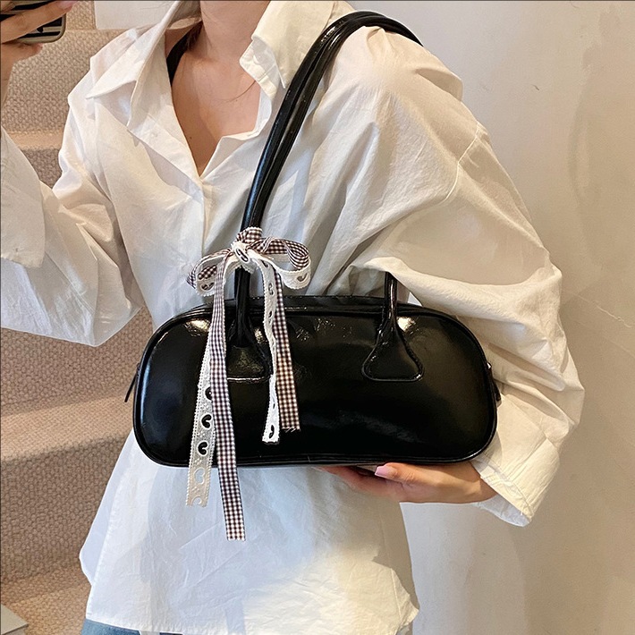 A niche bow handbag for women, a new trendy Korean-style textured underarm bag with a large capacity and pillow bag for the summer of 2025 full figure