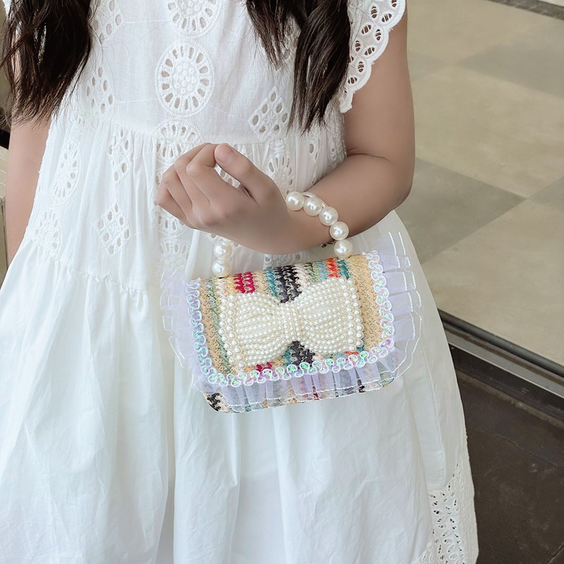 2025 New style girl gift for kindergarten Children's Day: Pearl bow, straw-woven hand-held bag, crossbody details Picture
