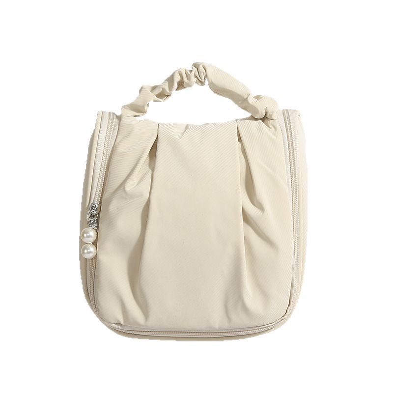 2025 New cute pearl large-capacity portable hand-held makeup bag, multi-functional toiletry and travel storage bag Item Picture