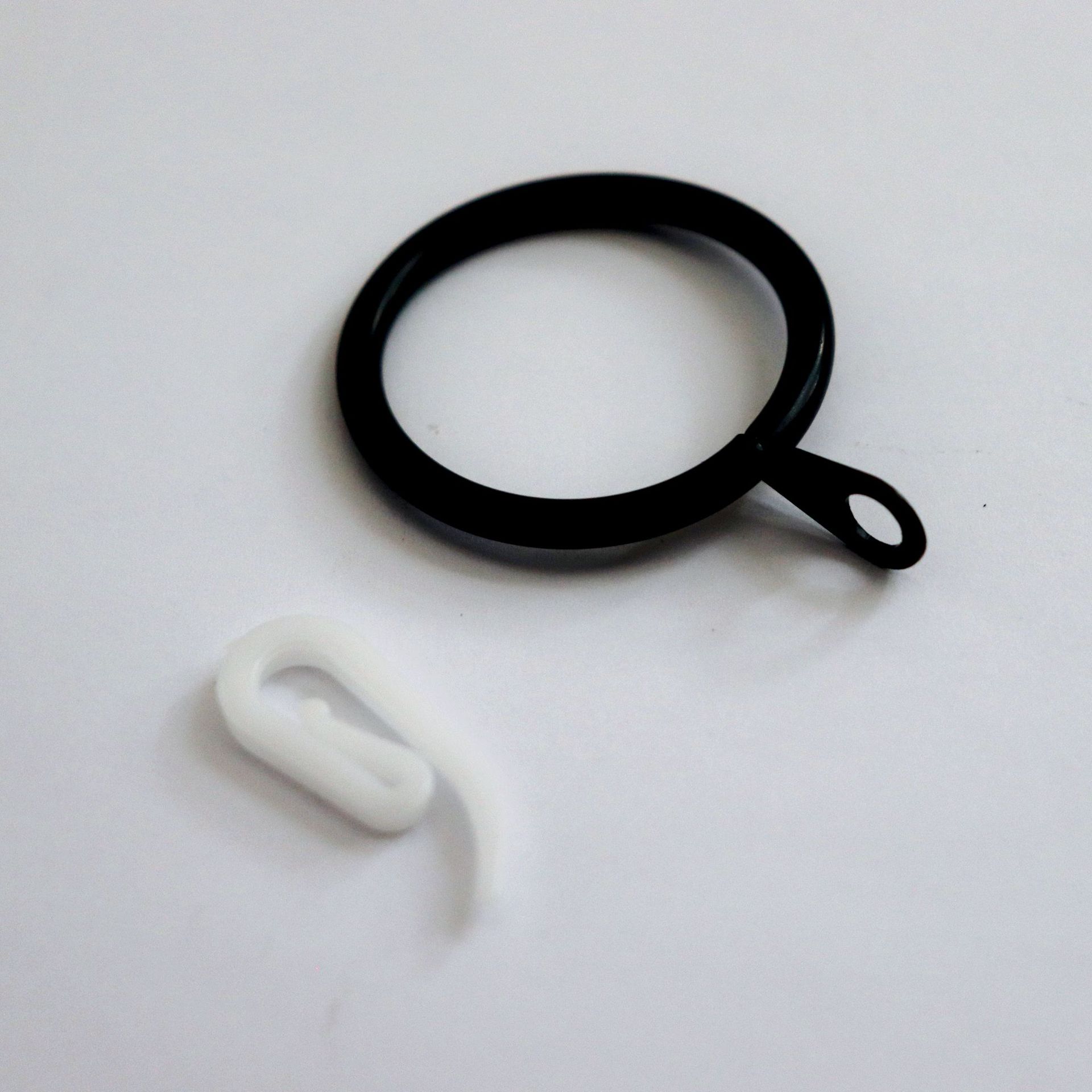We have curtain rings, plastic curtain hooks, curtain accessories, curtain ring accessories, shower curtains, comma hooks and 6-shaped hooks in stock full figure