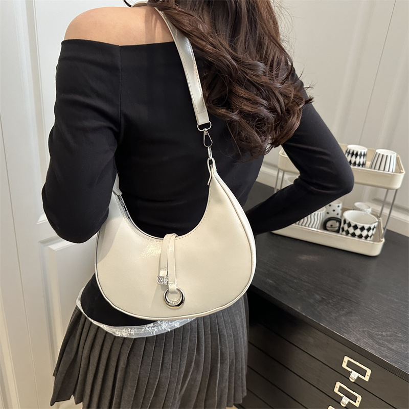 Simple and fashionable crescent-shaped bag for women, 2025 new Korean solid color niche design single-shoulder bag, elegant commuting crossbody bag Specification drawing