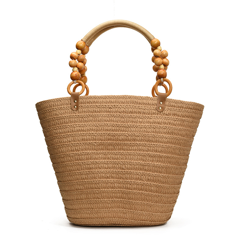 A niche design straw-woven bag for women, a new fashion hand-held shoulder bag for 2025, a large-capacity vacation beach bucket bag Item Picture