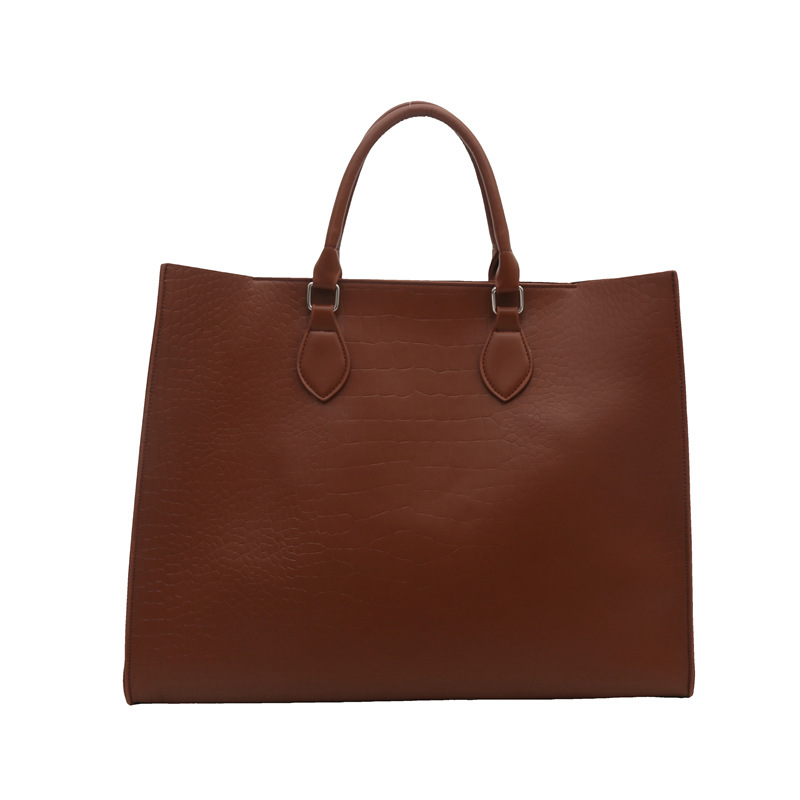 A stylish and large-capacity casual commuting single-shoulder bag for summer 2025, featuring a solid color, trendy and simple hand-held tote bag Item Picture