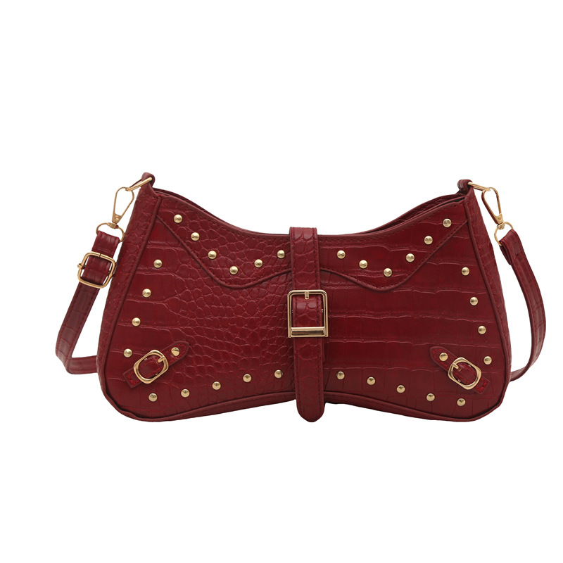 Rivet simple and retro 2025 summer personalized new fashion solid color trendy casual shoulder bag, underarm bag for women Item Picture