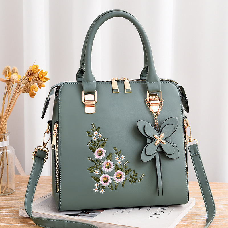 Factory direct sales of women's bags 2022 new style crossbody bags, middle-aged fashion embroidered handbags, cross-border foreign trade consignment details Picture