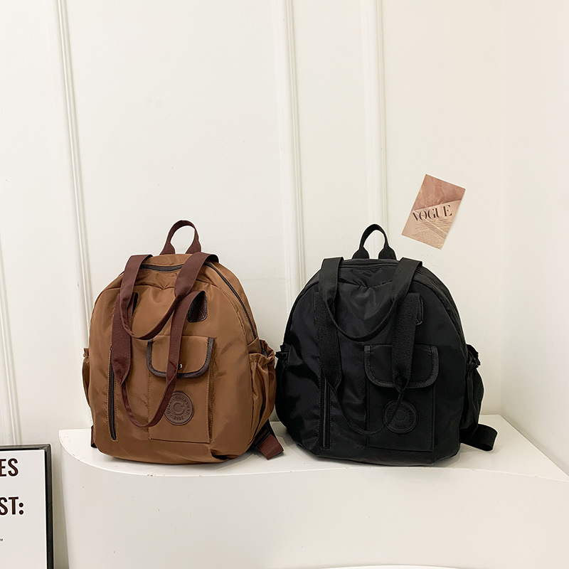 New autumn/Winter 2024 niche design, large-capacity, lightweight and simple backpack, high-quality hand-held shoulder crossbody bag Application Scenario