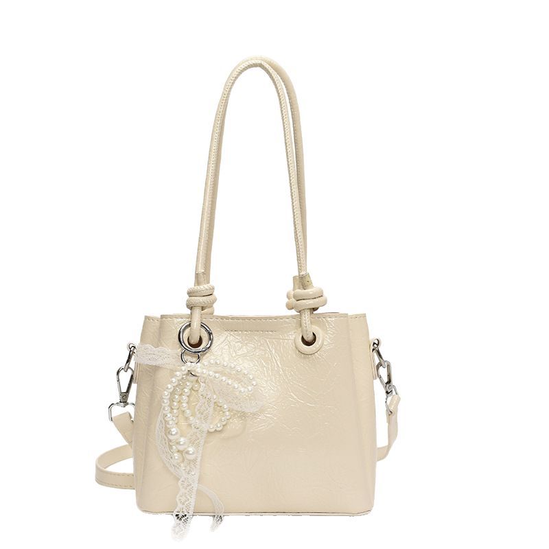 A niche wax oil leather tote bag for women, 2025 new retro and versatile single-shoulder underarm bag, casual hand-held bucket bag Item Picture