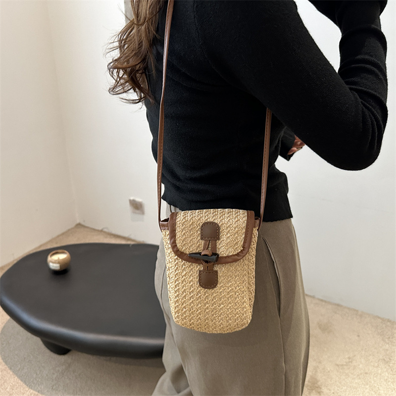 The 2024 new large-capacity, stylish summer rainbow-striped straw weaving bag for women. It is a small square crossbody bag for mobile phones details Picture