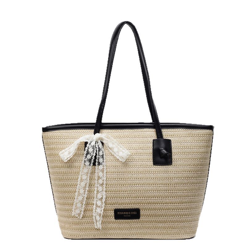 Summer seaside leisure vacation large-capacity tote bag for women 2025 New style fashionable straw woven simple hand-held shoulder bag Item Picture
