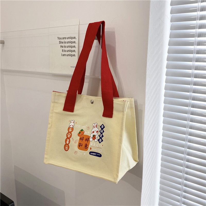 2024 New single-shoulder crossbody cute little rabbit hand-held bento bag, student canvas hand-held supplementary class fresh and sweet bag Specification drawing