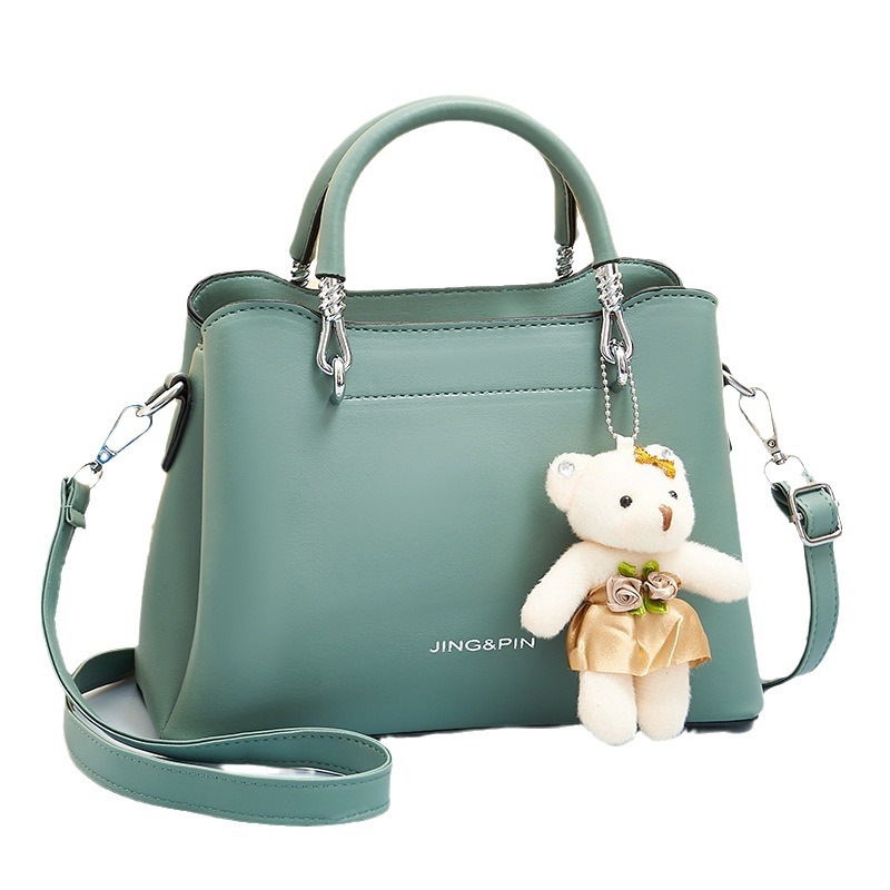 This 2024 new style of fashionable handbag is a trendy and elegant Korean-style single-shoulder lady's bag and a stylish bear crossbody bag Item Picture